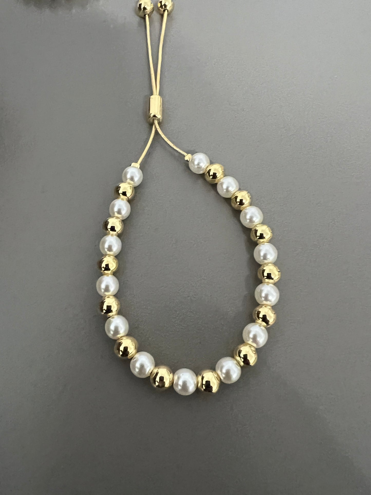 Add a charm bracelet