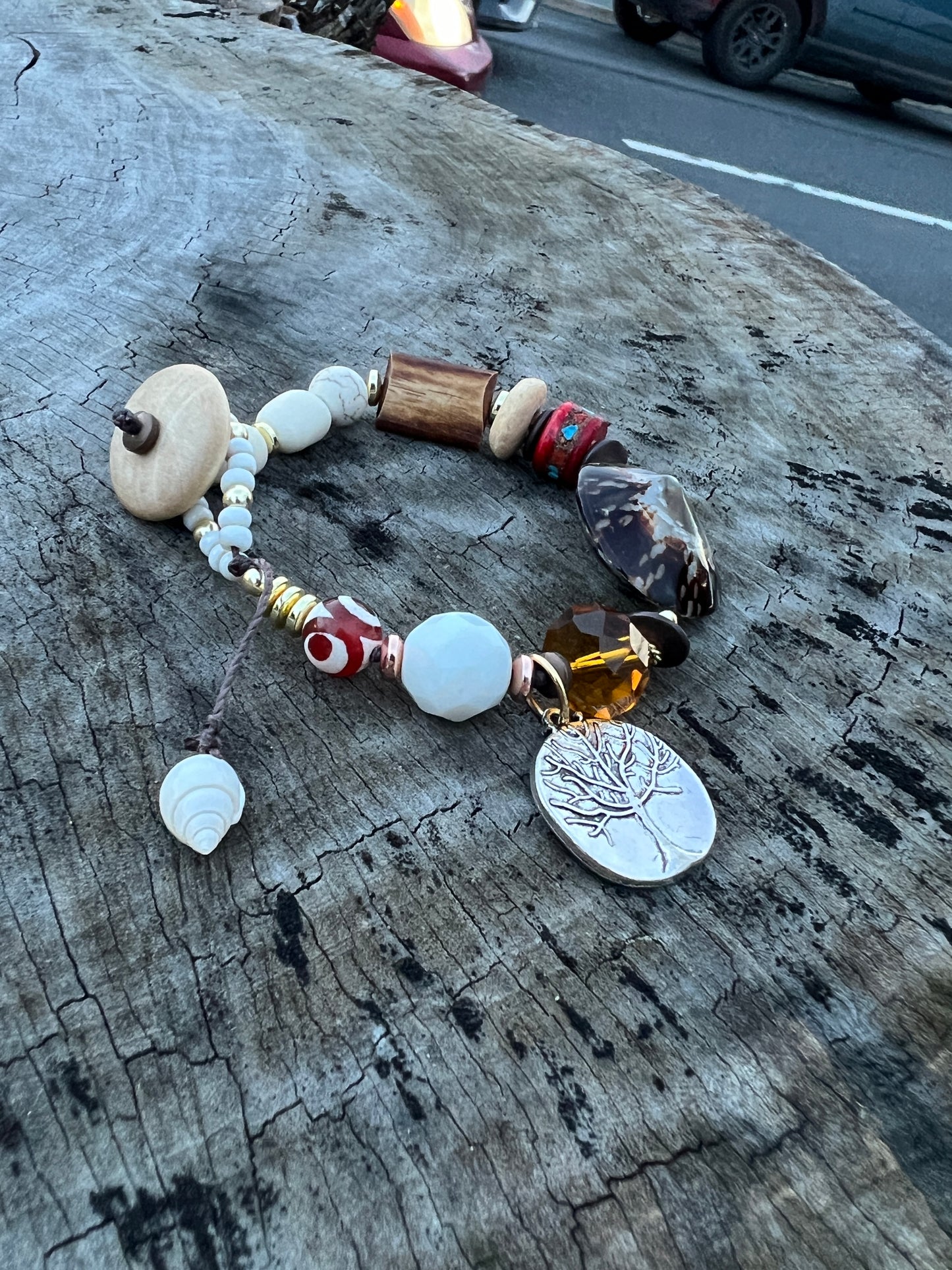 Taller pulsera con cierre de botón