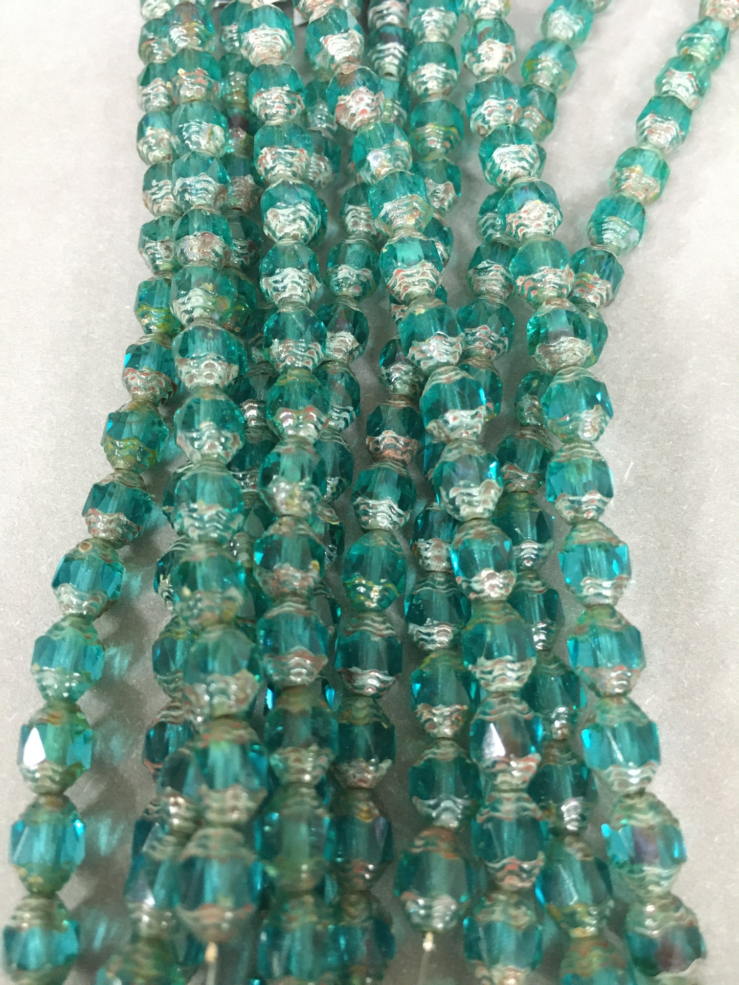 8mm Teal Cathedral Czech Strand / Irregular