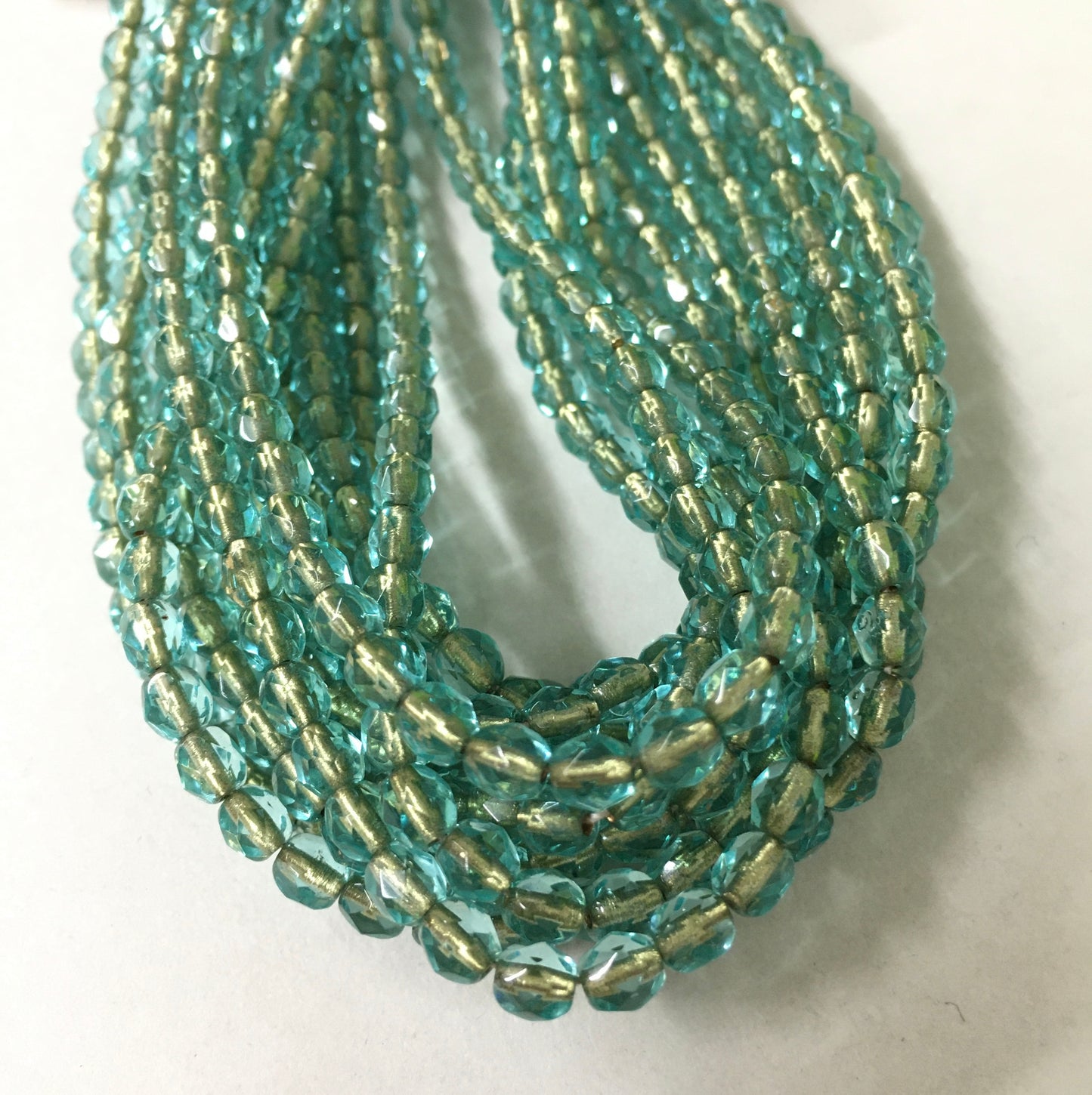 4mm Aqua and Gold Round Faceted Czech Strand / Redondo