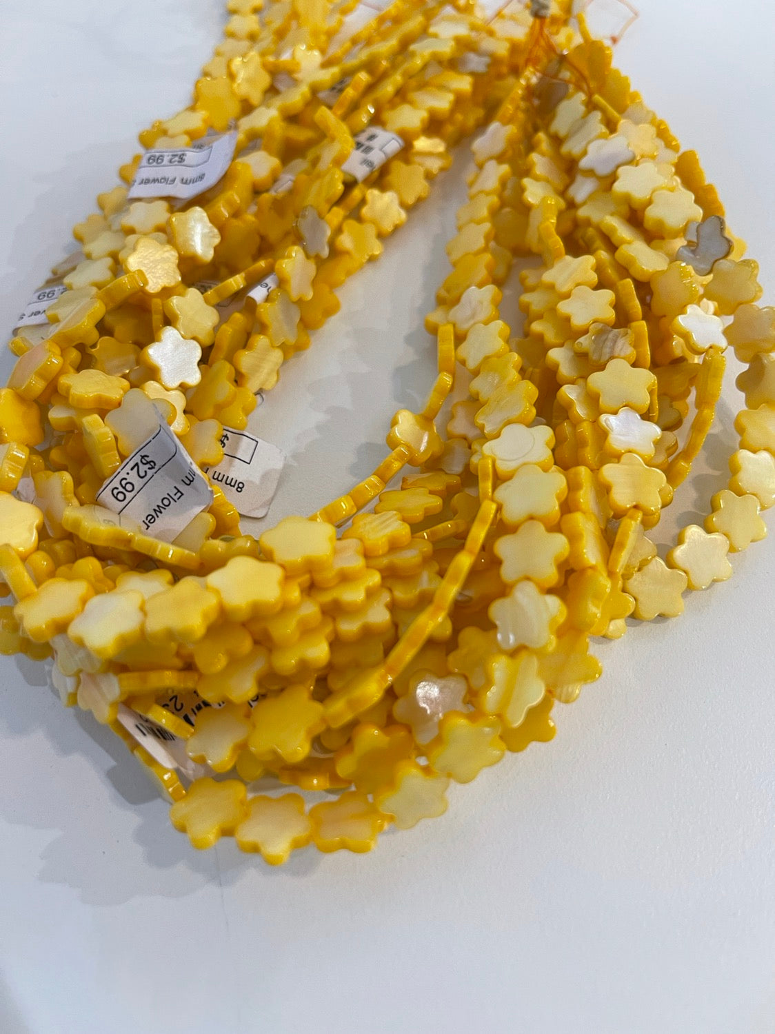 8mm flower shell strand 23562 qty 45 flowers per strand