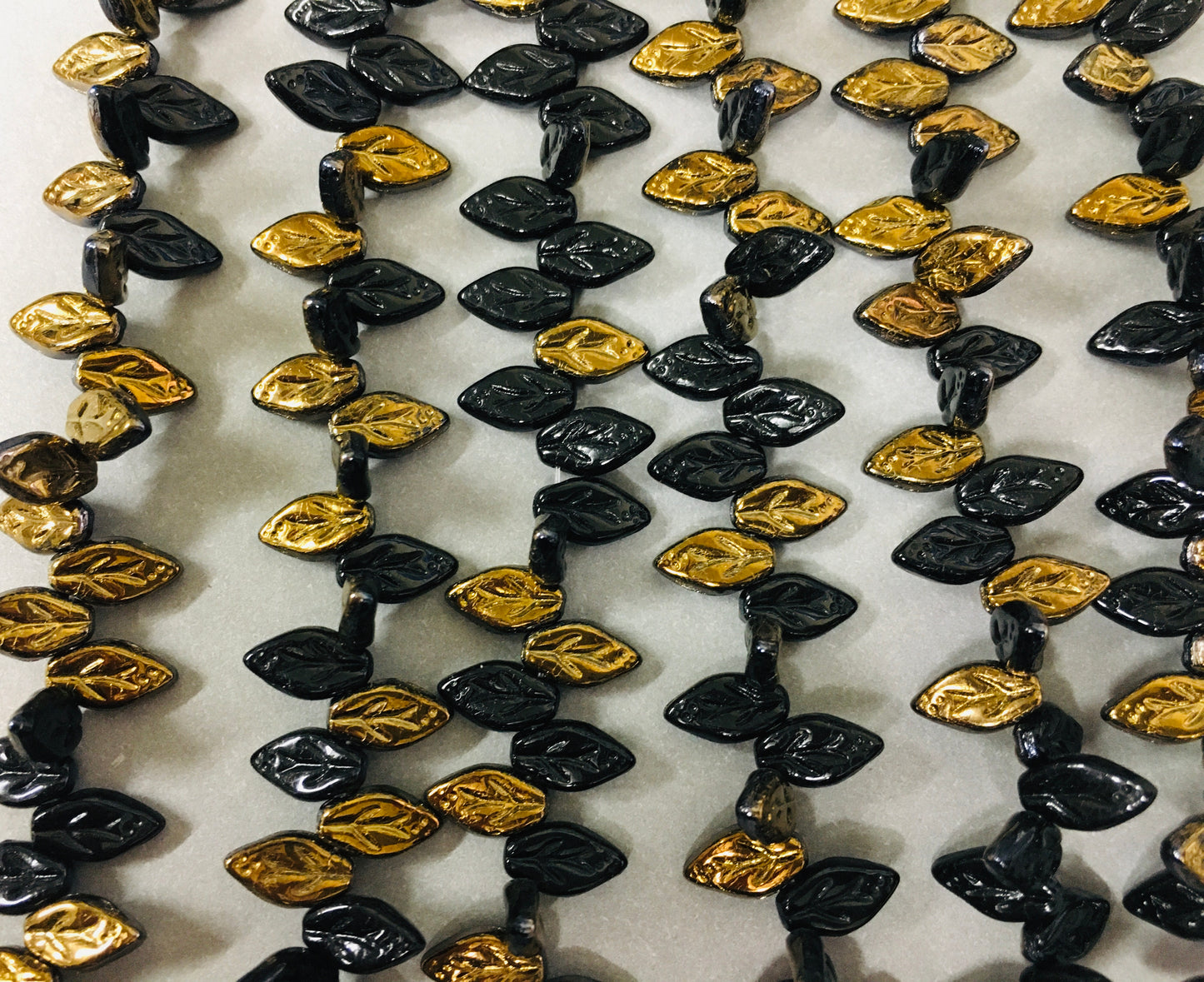 10mm Black and Gold Leaf Czech Strand / Hoja