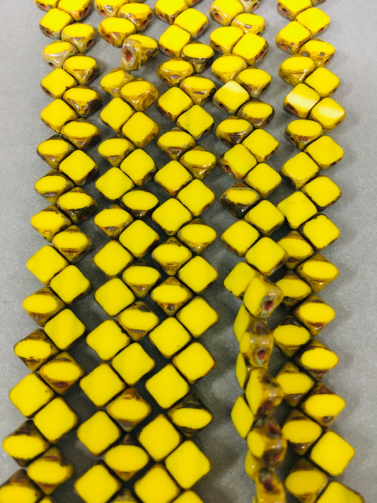 6mm Yellow and Brown Sideways 4 Hole Czech Strand / Diamante Cuadrado