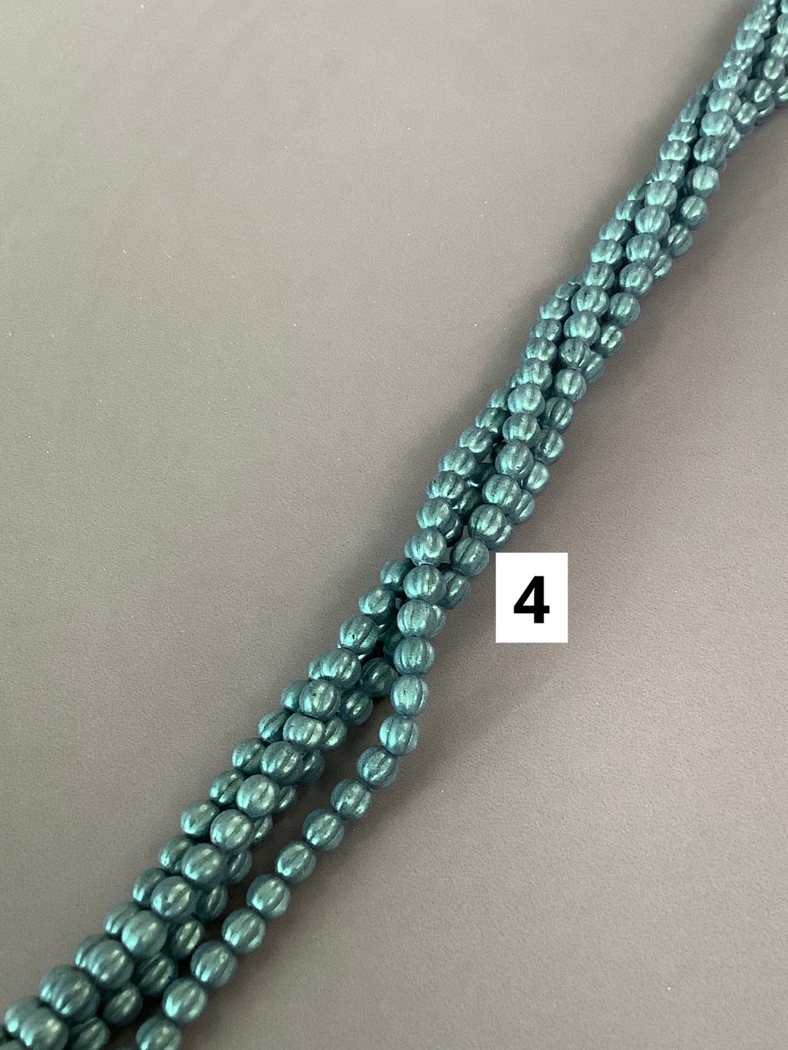 5mm Round with Line Czech strand qty 50 aprox