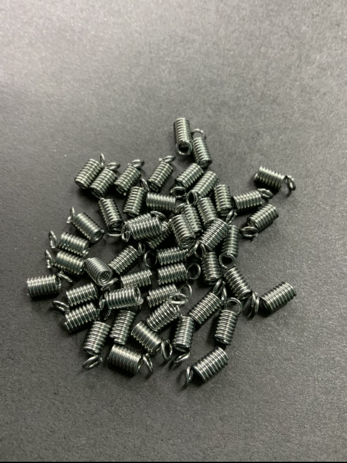 Spring end for cord Qty 50