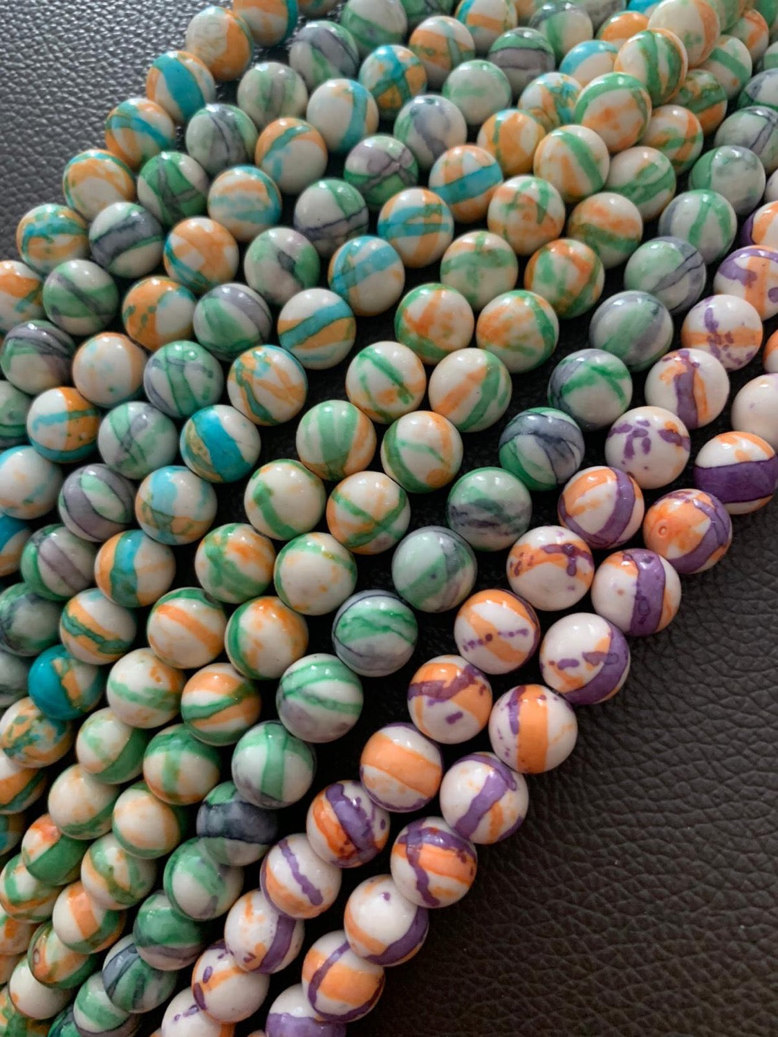 10mm Jade with Cream Qty 38 bead