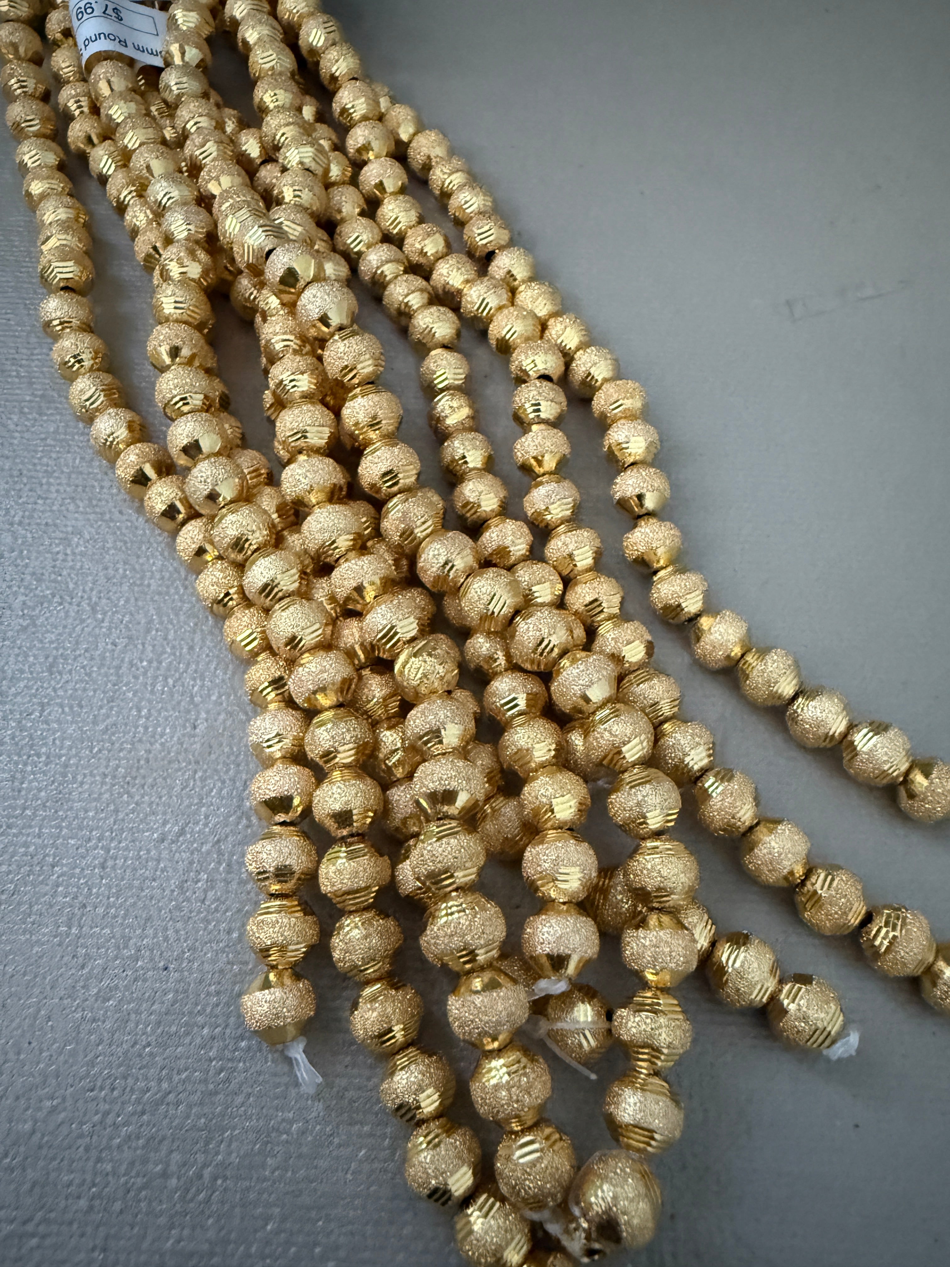 8mm Round Spacer GC (26664) – Sun Beads Caguas