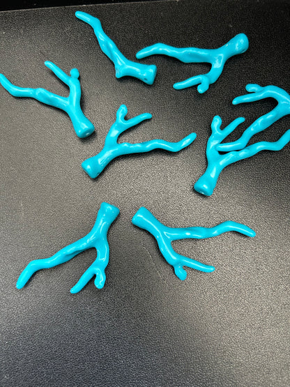2 inches long coral stick