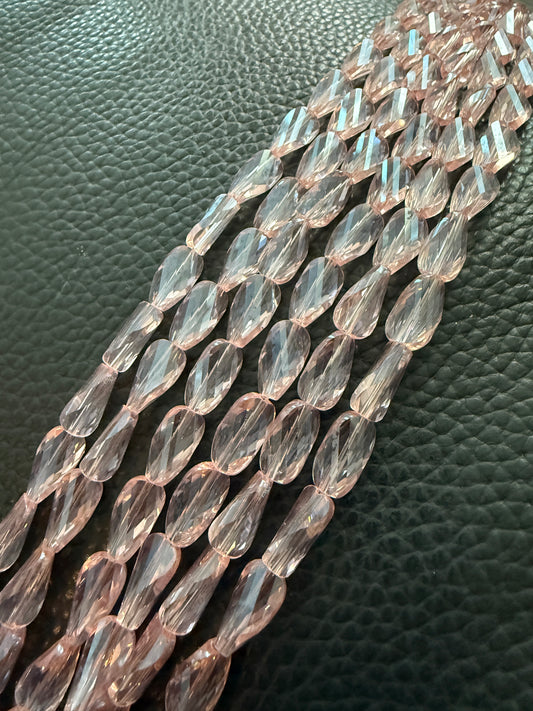 14x8mm twisted faceted cristal light rose.