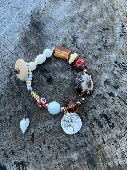 Taller pulsera con cierre de botón