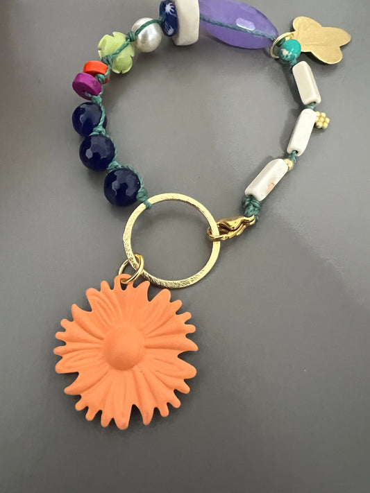 Kit with orange flower