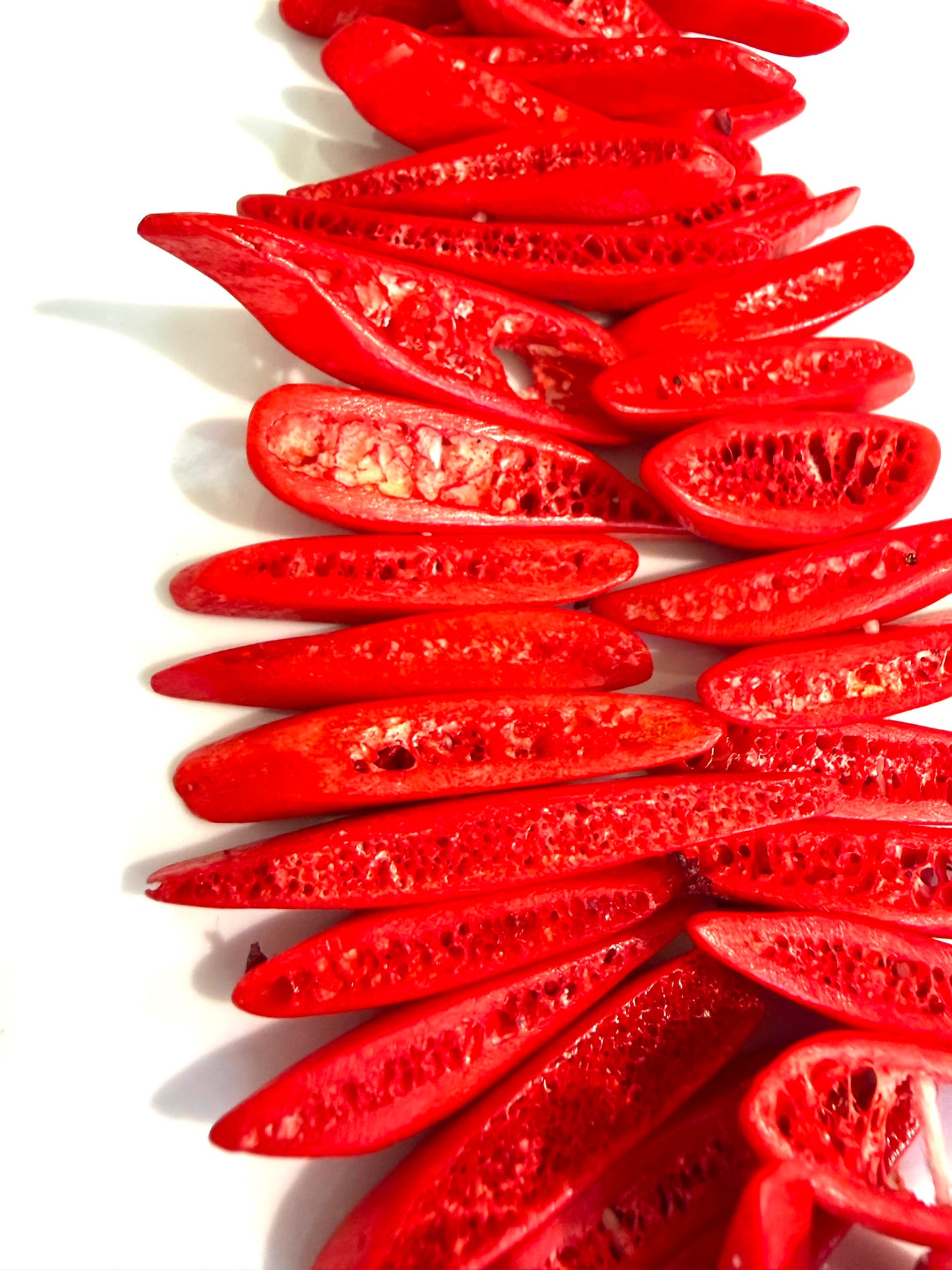 Bone Spikes (Orange) (1/2 Strand)