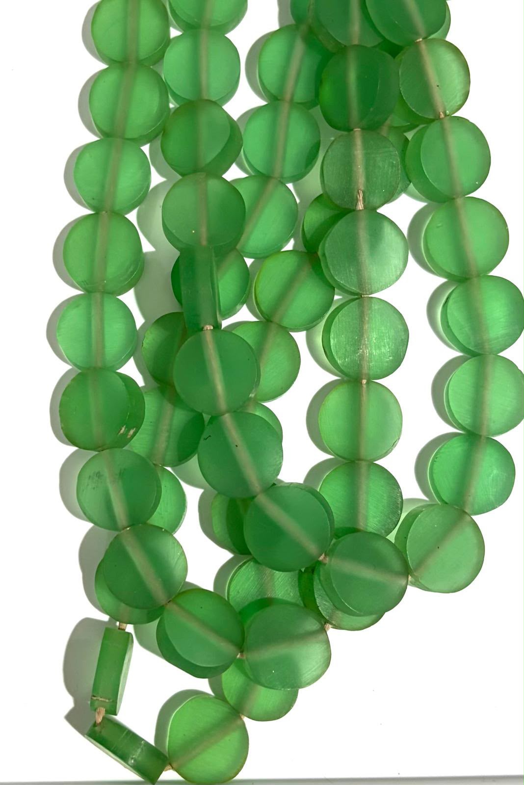 Green Coin Strand