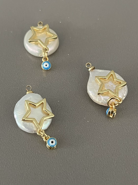 23mm freshwater pearl with star/eye. 19282