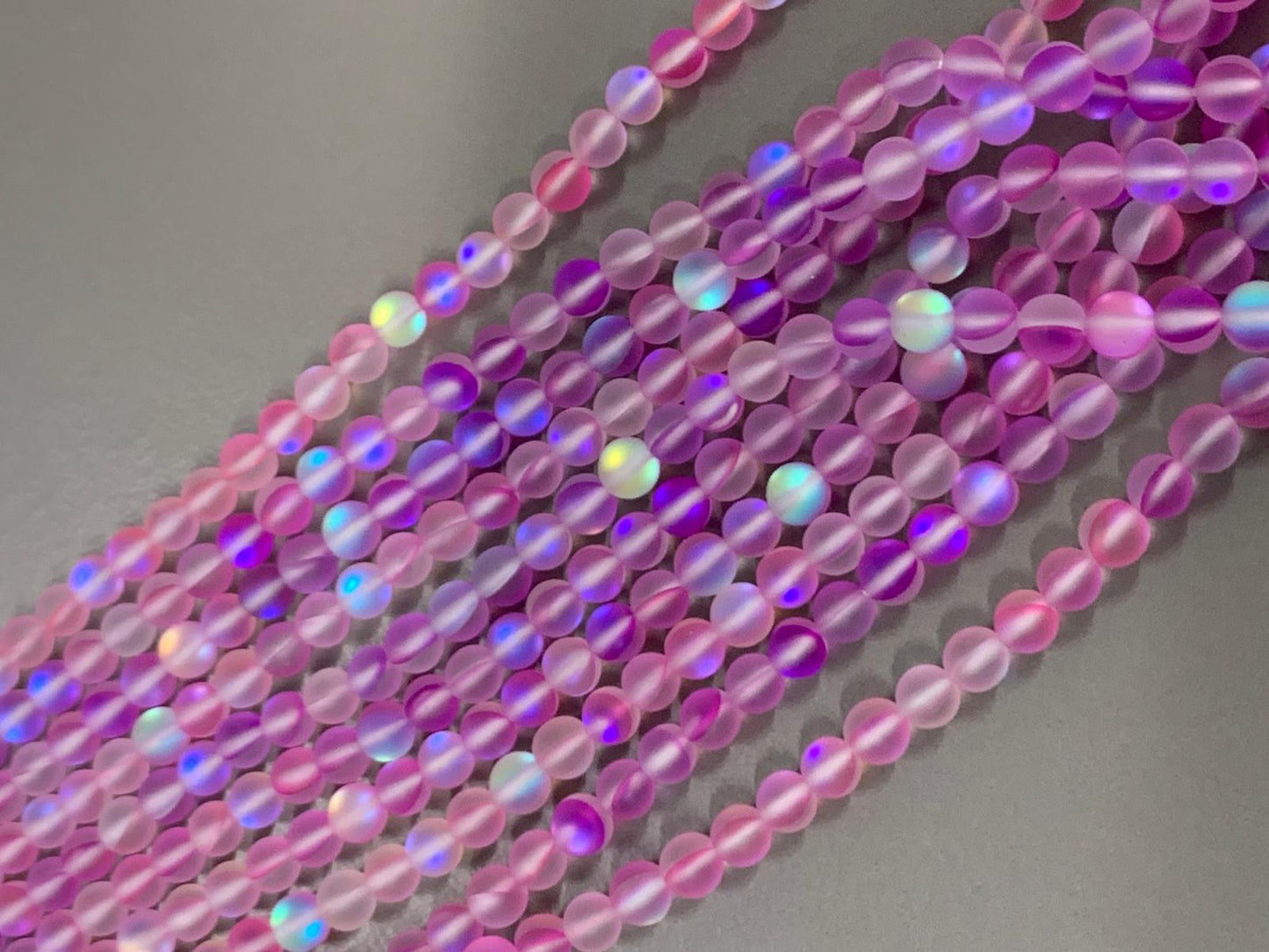 6mm AB Translucent Pink / Violet Matte Qty 62 beads per strand 21737