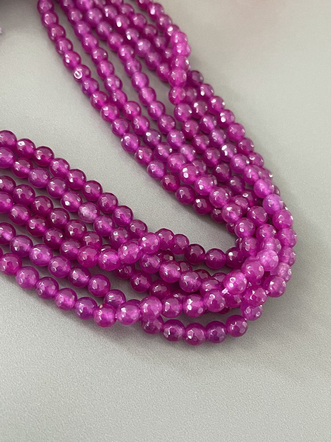 6mm magenta faceted jade 21965