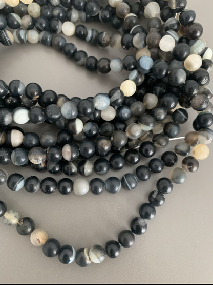 8mm Black and cream banded agate matte qty 47 beads 21643
