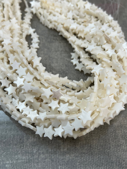Moon, star, flower, hearts strand 15 inch strand