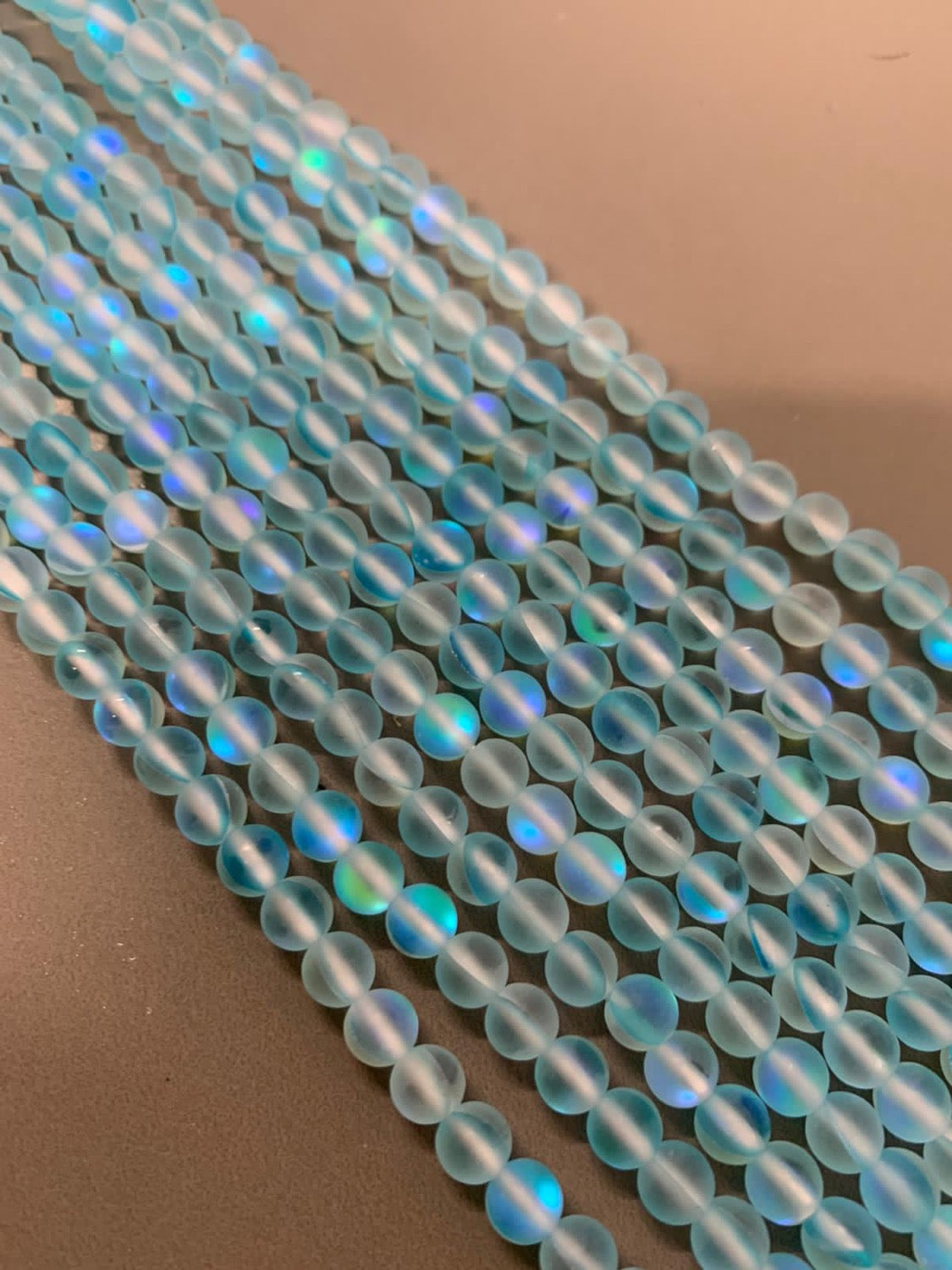 6mm AB Translucent  Light Blue Matte Qty 62 beads per strand 21737