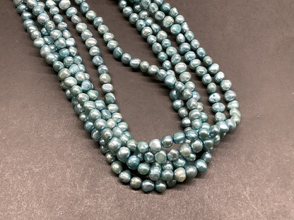 4-9mm Freshwater Pearl strand Qty 70 aprox. 10804