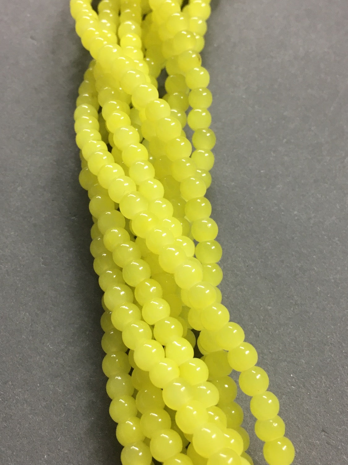 4mm Yellow Jade Strand Qty 94 aprox 20965