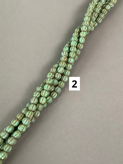 5mm Round with Line Czech strand qty 50 aprox