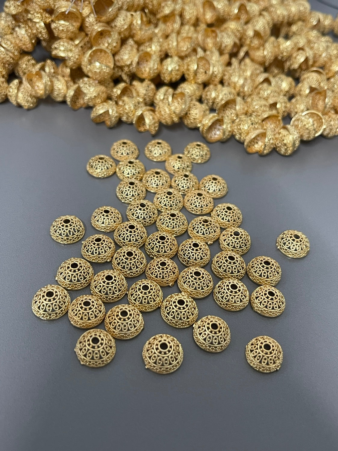 13mm cap gold fancy, qty 43 per strand 23398