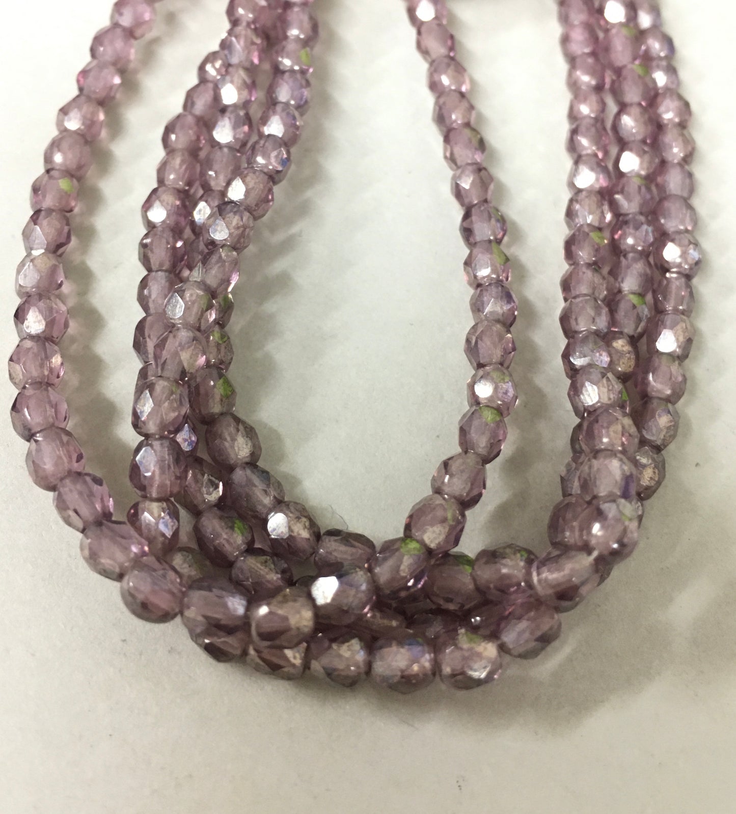 4mm Purple Round Faceted Czech Strand / Redondo