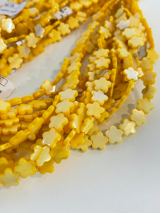 8mm flower shell strand 23562 qty 45 flowers per strand