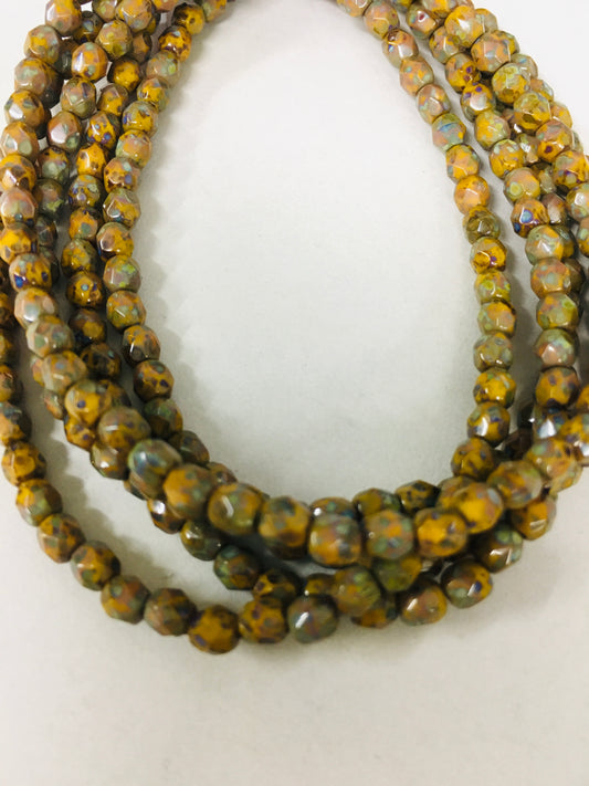 4mm Mustard Round Faceted Czech Strand / Redondo