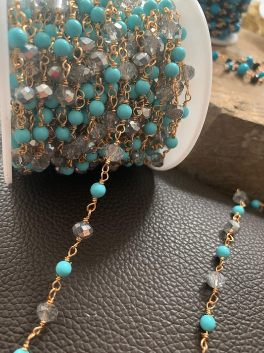 Turquoise and Silver Crystal with golWrapped Chain per feet / por pies 21178