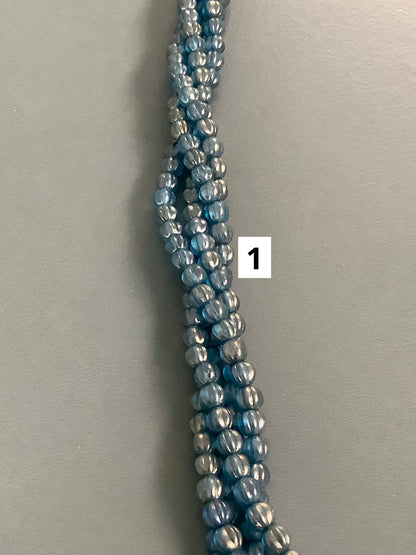 5mm Round with Line Czech strand qty 50 aprox