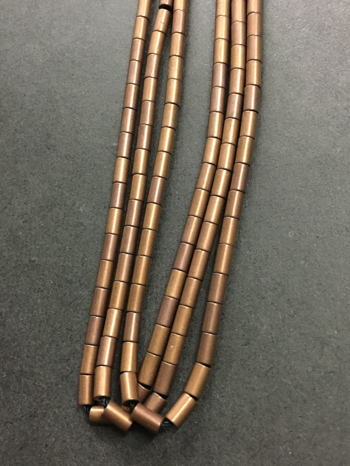 4-5mm Tubular Hematite Bronze 11726