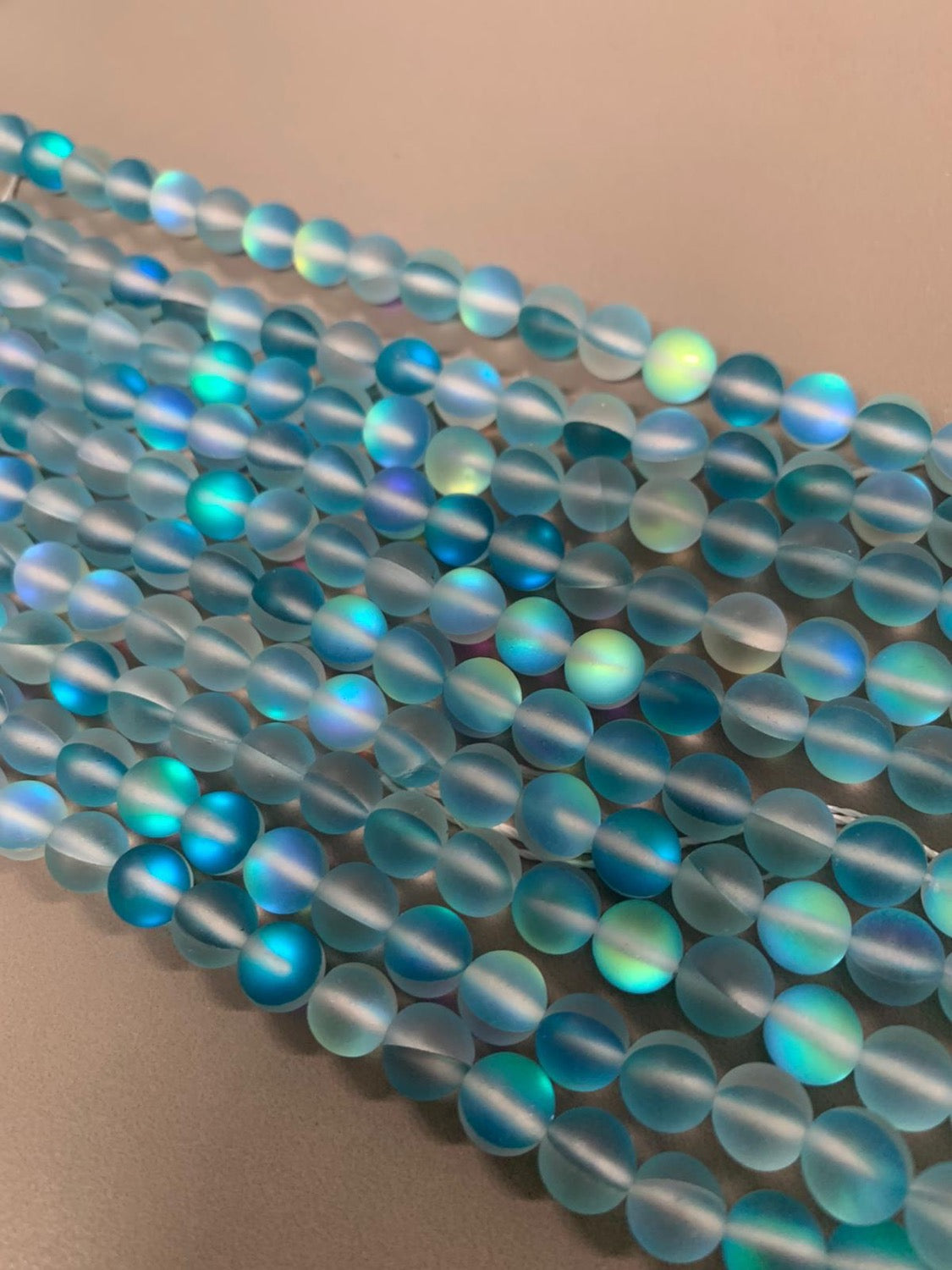 8mm AB Translucent Blue/Teal Matte Qty 48 beads per strand 21738