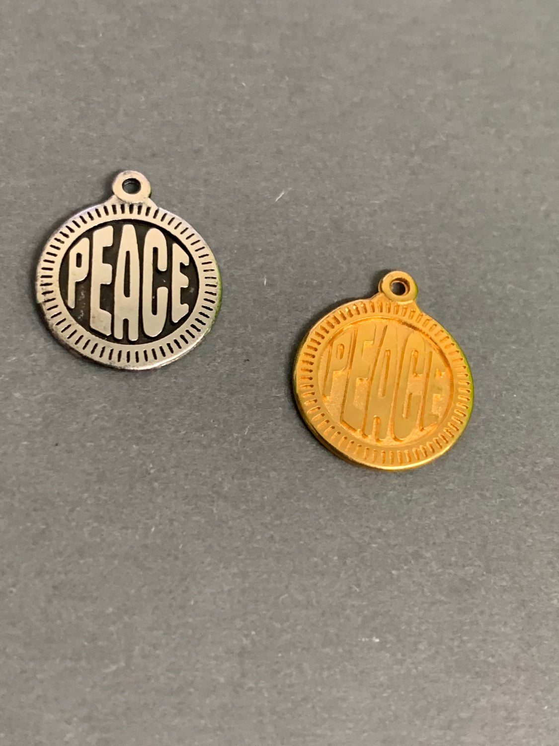 15mm round with message Peace qty 1